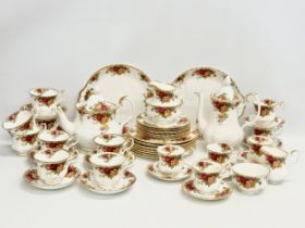 A large 50 piece Royal Albert ‘Old Country Roses’ tea and coffee service. 8 salad plates, 21cm. 8