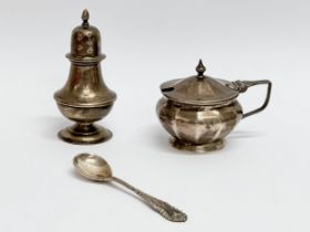 3 pieces of silver. An Irish silver spoon, Dublin mark, 6.33 grams. A sugar pot, Birmingham mark,