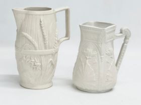 2 mid 19th century Copeland Parian Ware jugs. A Harvest Barrel jug 13x18cm.