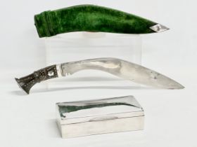 A sterling silver presentation box and a silver mounted Gurkha Kukri knife. Presented to a Belfast