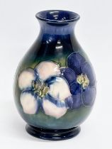 A vintage signed Moorcroft ‘Clematis’ baluster vase. 12cm