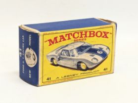 A vintage Matchbox Ford G. T. Racing Car model in original box.