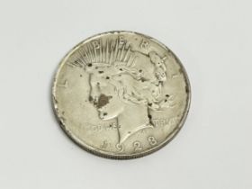 A US silver dollar. 1928.