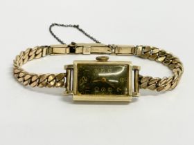 A vintage 14ct gold ladies watch. Case only.