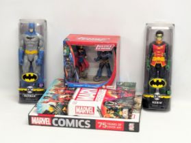 A sundry lot including 2 DC Comic figures of Batman and Robin by Spin Master, a Marvel Encyclopedia,