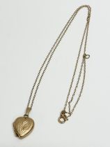 A vintage 9ct gold locket necklace. 2.81 grams.
