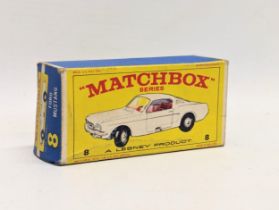 A vintage Matchbox No.8 Ford Mustang model car in original box.