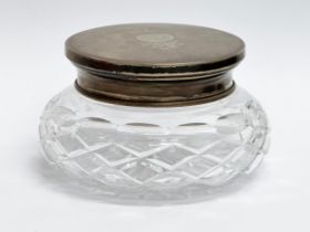 A vintage silver lidded powder jar by Broadway & Co. 11x6.5cm