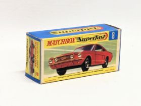 A vintage Matchbox Super fast No. 8, Ford Mustang in red/orange, with original box.