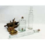 A Sundry lot. A large vintage glass Esso oil bottle 38cm. A Dunlop French Chalk and Rubber Solution.