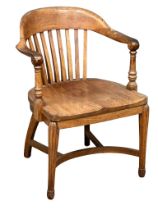 An early 20th century American oak desk chair by Sikes. Circa 1900.