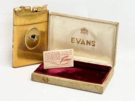 A vintage Evans gold plated cigarette case lighter with box. Lighter 13cm.