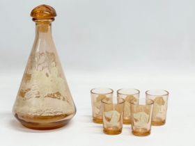 A vintage hunting theme drinks set. Decanter 19cm. Shot glasses 5cm