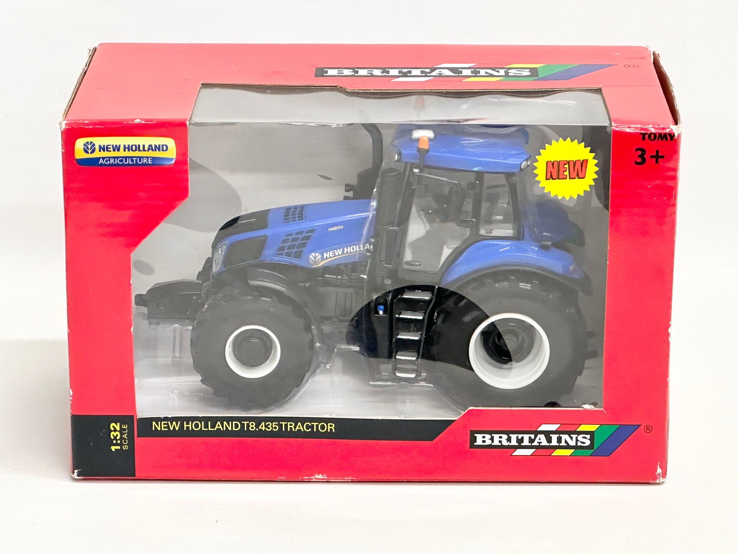 A new Britains New Holland T8.435 Tractor with box. 25x13x16cm