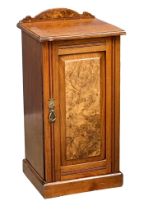 An Edwardian walnut bedside locker. 39x36x81cm