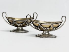 A pair of late 19th century plated salt cellars by Henry, Edward and Frank Atkin. Circa 1880.