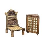 An early 20th Century Indian Pida chair and corner cabinet