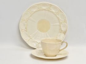A 3rd Period Belleek ‘Tridacna’ trio cup and saucers. 20cm