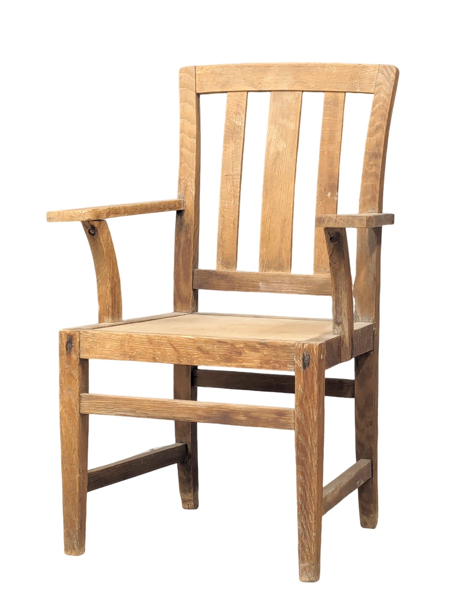 An early 20th Century Oak armchair