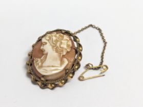 A vintage rolled gold cameo brooch.