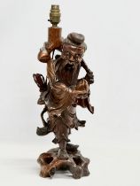 A large early 20th century Chinese carved boxwood table lamp. 52cm