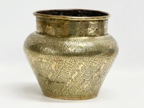 A late 19th century Persian brass jardiniere. Circa 1880-1900. 24x21cm