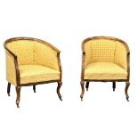 A pair of Edwardian tub chairs.