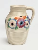 A 1930’s Clarice Cliff ‘Anemone’ Lotus jug. Designed for Newport Pottery.