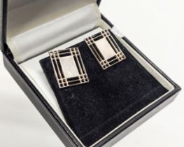 A pair of silver earrings by The Rennie Mackintosh Collection.