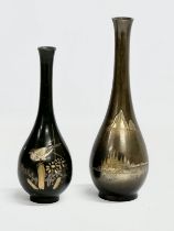 2 signed good quality late 19th century Japanese bronze vases. Decorated with Pagodas, Mountains,