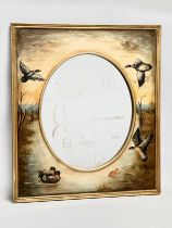 A large good quality gilt framed mirror with painted ducks and birds in flight. 77x88cm