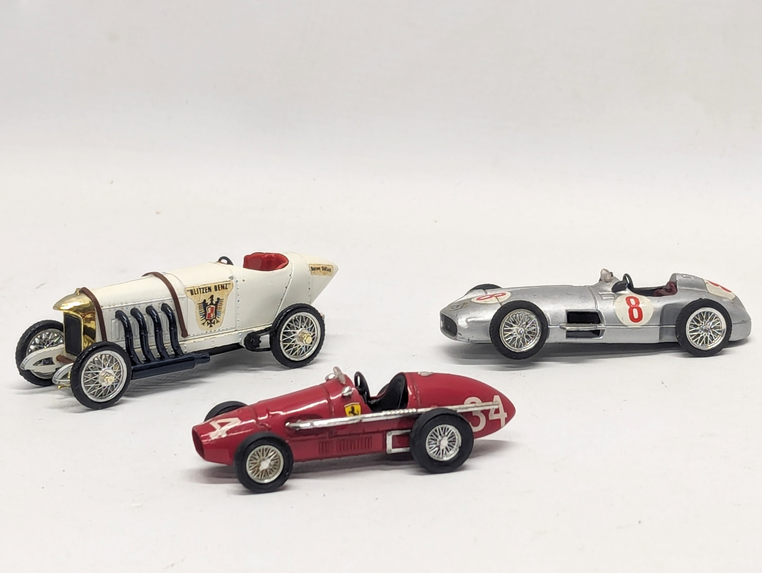 A collection of 3 Brumm model cars, including a Ferrari F2 500 1953, a Blitzen Benz Indianapolis