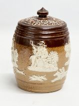 A late 19th century Doulton Lambeth ‘Harvest’ tobacco jar. 9x14cm