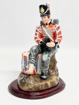 A rare Royal Doulton ‘Drummer Boy’ figurine. H.N. 2679. Royal Doulton Tableware LTD, 1975. 16x23cm