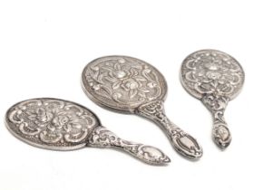 A set of 3 ornate silver vanity mirrors. Turkish, 1923-1939. Largest measures 17.5cm