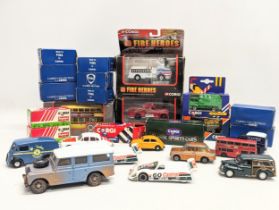 A collection of model cars and trucks by Corgi, including The Showcase Collection 'Fire Heroes,'