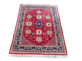 A Middle Eastern style hand knotted Khotan rug. 174x258cm