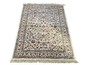 An Iranian Middle Eastern rug. 176x117cm
