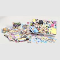 A large collection of Lego with Lego manuals