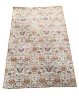 A large Middle Eastern style rug. 395x215cm