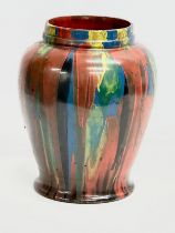 A large early 20th century French splash painted stoneware pot. Circa 1900. Vallauris, France.