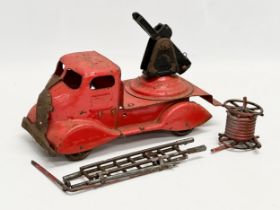 A vintage Tri-ang tin plate fire truck. 24cm