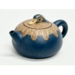 A Chinese Yixing clay duck design teapot. Impressed mark. 15x10x9cm