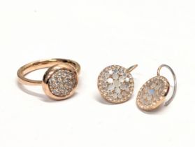 A Fossil earring and ring set. UK size Q.