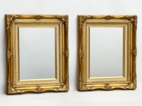 A pair of gilt framed mirrors. 41x52cm