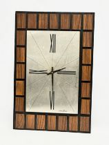A Mid Century Seth Thomas wall clock. 34.5x52cm