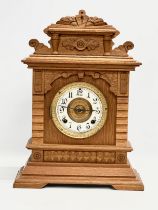 A large late 19th century American oak mantle clock. Ansonia Clock Co. Eight Day Syria Strike. Circa