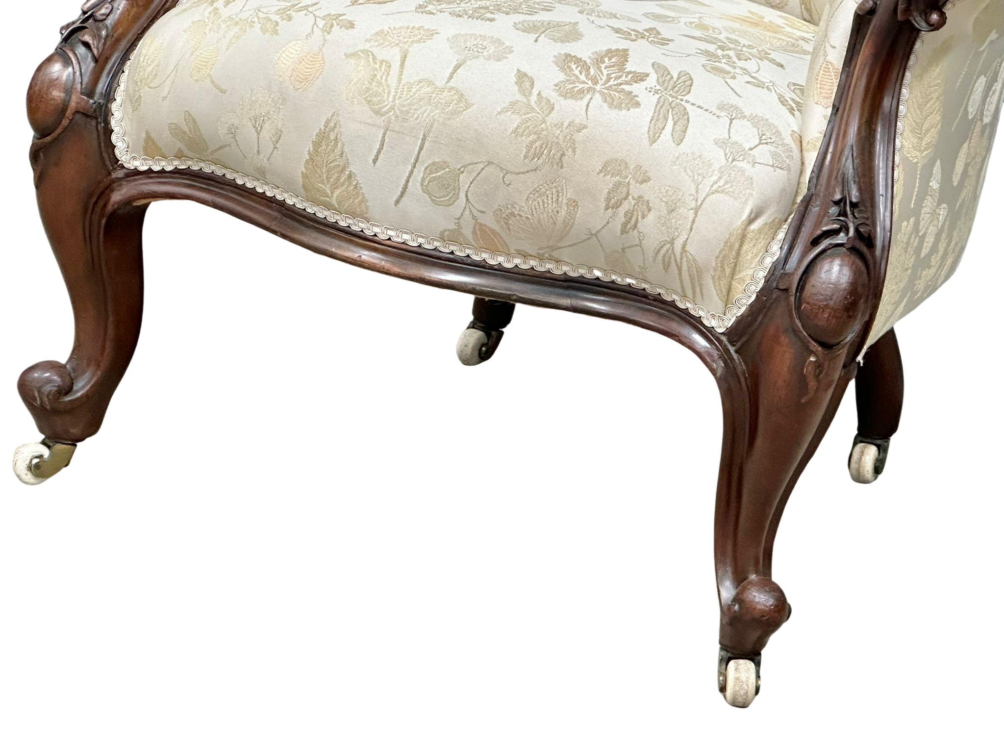 A large Victorian Mahogany deep buttoned back gents armchair on cabriole legs. Circa 1860 - Image 4 of 5