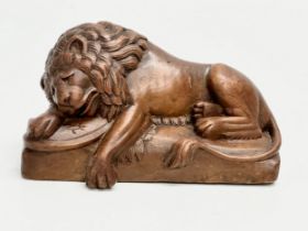 A good quality carving of the Lion of Lucerne. 14x7x8cm