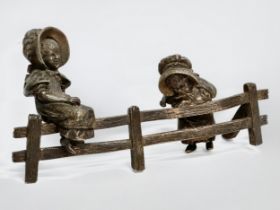 A bronze ‘Two Little Girls Sitting’ figurine. 16x8cm